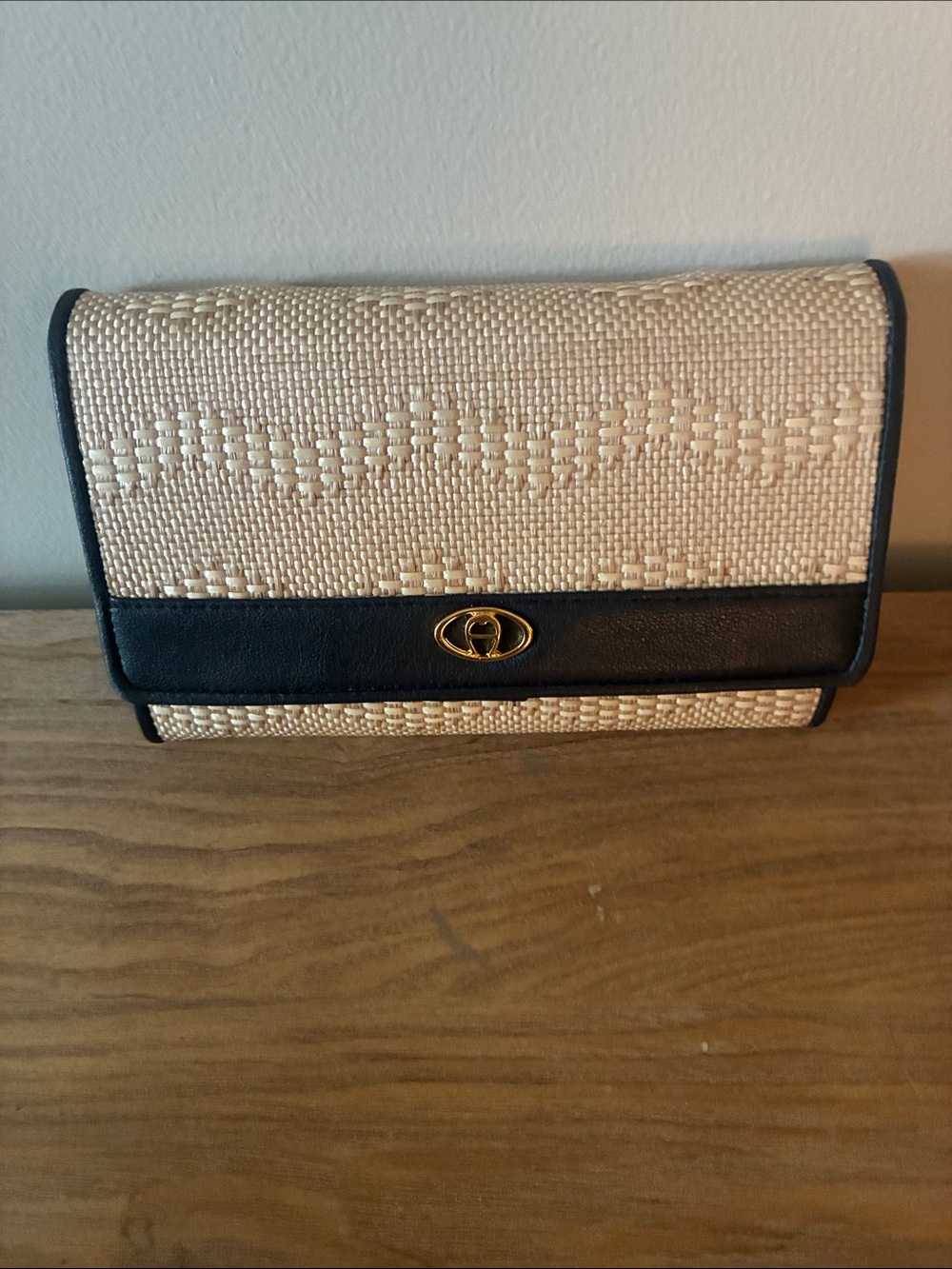 Etienne Aigner Cream Woven Clutch with Black Trim and Gold-Tone Hardware